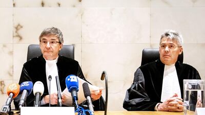President C.A. Streefkerk (L) looks on before the Supreme Court ruling in the cassation proceedings of "the Mothers of Srebrenica" (group of victims' relatives) case against the Dutch State at the Dutch supreme court AFP