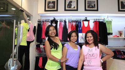 From left, Lorna Espina, Grace Nisperos and Rossana Garcia have all seen an improvement in their health while working at Lorna Jane. Sarah Dea / The National