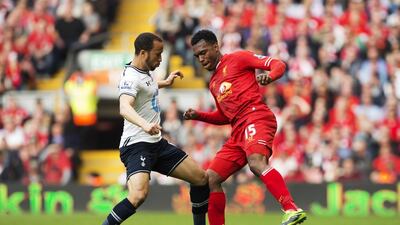 While Tottenham midfielders such as Andros Townsend, left, have tried to build around the forwards, Liverpool have Daniel Sturridge, right, still leading the attack after Luis Suarez’s departure. Jon Super / AP Photo