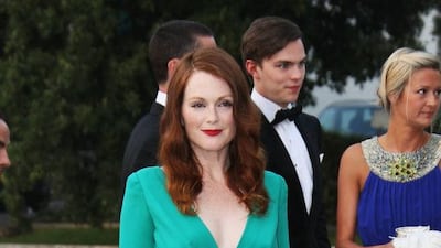 2009: Julianne Moore in her signature hue, an emerald green Tom Ford.
