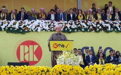 Masoud Barzani, centre, leader of the Kurdistan Democratic Party, at an electoral campaign rally at Franso Hariri Stadium in Erbil. AFP