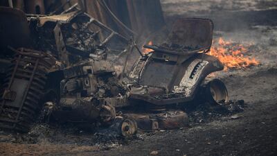 A shed is seen destroyed by fire at a property in Kulnura, Australia. EPA