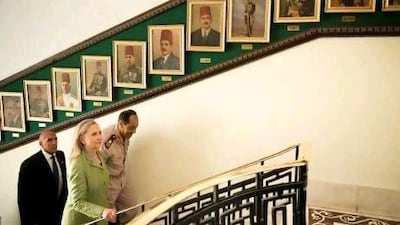 US secretary of state Hillary Rodham Clinton accompanies Hussein Tantawi to a meeting at the Ministry of Defence in Cairo yesterday.