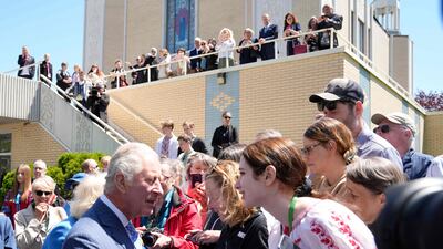 Britain's Prince Charles greets a well-wishers after leaving a Ukrainian church in Ottawa on their Canadian Royal Tour, on May 18, 2022. AFP