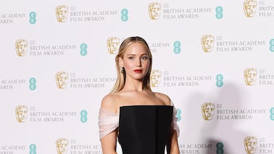 Jennifer Lawrence looked statuesque in Christian Dior Couture - the square neckline is beautiful, and the organza sleeves add a delicate touch. Andy Rain / EPA.