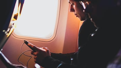 Onboard Wi-Fi means people can be switched on even when they're cruising at 30,000 feet. Daniel McCullough / Unsplash