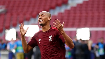 Fabinho grimaces during the training session. AP Photo
