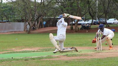 Cricketers play last Sunday in Rwanda at Kicukiro, the former technical school of Kigali where thousands of Rwandans were killed during the 1994 genocide. Stephanie Aglietti / AFP / September 7, 2014