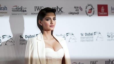 Sonam Kapoor walks the red carpet during the opening night of Dubai International Film Festival. Christopher Pike / The National.