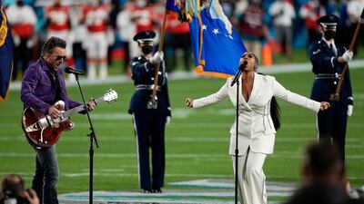 Eric Church and Jazmine Sullivan performs the national anthem before the NFL Super Bowl 55 football game. AP