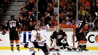 Jonathan Toews, in white, of the Chicago Blackhawks celebrates his second goal in the first period against the Anaheim Ducks in Game 7 of the Western Conference Finals on May 30, 2015 in Anaheim, California. Harry How/Getty Images/AFP