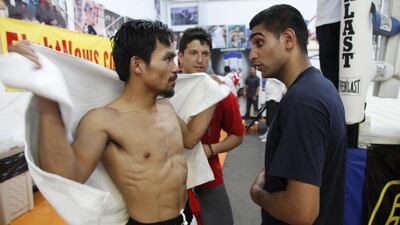 Manny Pacquiao’s proposed fight with Amir Khan will not happen in the UAE or perhaps anywhere else as Bob Arum weighs up other opponents for the Filipino fighter. Steve Marcus / Reuters