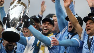 New York City forward Valentin Castellanos celebrates with the trophy. AP