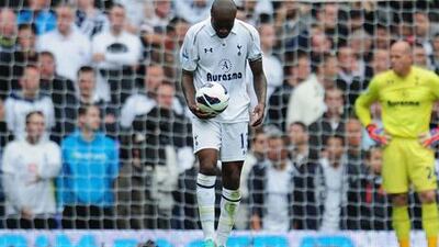 A dejected William Gallas walks away from the Spurs goal after seeing his side concede against former club Chelsea