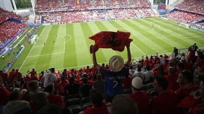 Albanian supporter cheers prior to the Uefa Euro 2016 group A preliminary round match between Albania and Switzerland at Stade Bollaert-Delelis in Lens Agglomeration, France, 11 June 2016. Shawn Thew / EPA