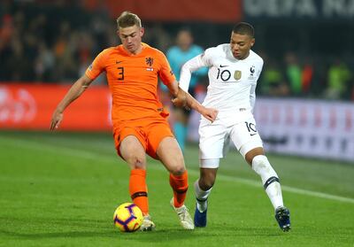 Matthijs de Ligt, left, of the Netherlands kept Frenchman Kylian Mbappe at bay last week. Getty Images