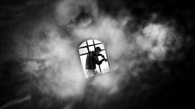 Mahmud, a Muslim Arab living in Ras al Ain, fixes the broken windows of the Mar Tuma (St. Thomas) church in Ras ai Ain. The church was damaged by Islamic insurgents when they took control of the town from Government forces. Before they abandoned the town in July 2013 they ransacked the church.