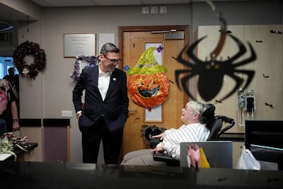 UK Prime Minister Andy Burnham visits Humphrey Booth Resource Centre, which cares for those suffering from dementia, in Manchester last week. AFP