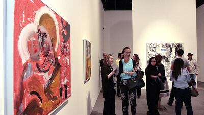 Striking images in acrylic, pastel and ink by Mohamed Al Mazrouei at the Emirati Expression: Realised exhibition in Manarat Al Saadiyat. Jeffrey E Biteng / The National