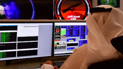 Mission staff monitor the weather over southern Japan before the launch of Hope probe was postponed because of wet conditions on Tanegashima island. AFP