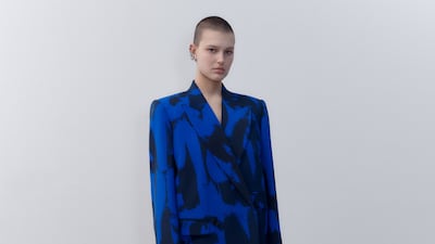 An electric blue suit from the autumn/winter 2022 pre-collection from Alexander McQueen. Photo: Alexander McQueen