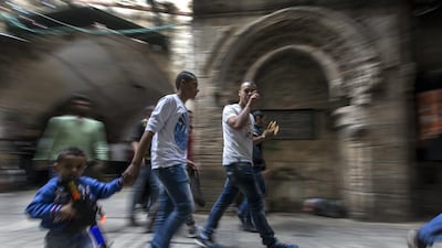 Palestinian youth go to Friday prayers at Al Aqsa Mosque in Jerusalem’s Old City on November 14, 2014. Jim Hollander / EPA