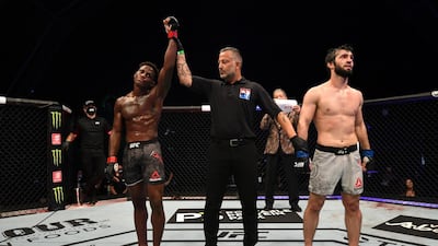 Hakeem Dawodu of Canada reacts after defeating Zubaira Tukhugov of Russia in their featherweight bout. Josh Hedges / Zuffa LLC