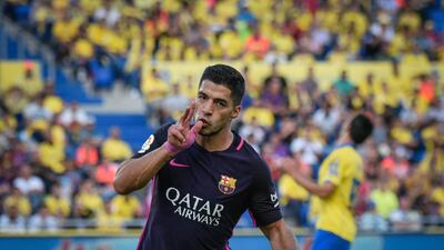Barcelona’s Uruguayan forward Luis Suarez celebrates a goalagainst Las Palmas. Desiree Martin / AFP