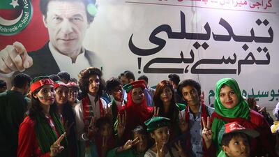 Supporters of Imran Khan, head of Pakistan Tehreek-e-Insaf (PTI) party celebrate in Karachi, Pakistan. EPA