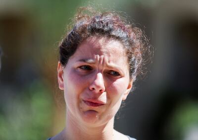 A Ukrainian tourist, Solomia, at the Egyptian Red Sea resort city of Hurghada, cries over the war in her country. Reuters.