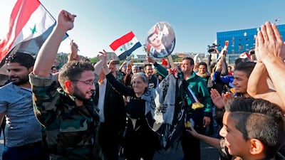 There was a large turnout of demonstrators supporting president Assad in Umayyad Square in Damascus. Louai Beshara / AFP Photo