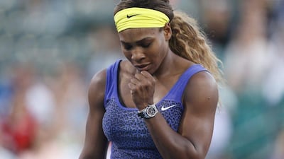 Serena Williams reacts during her second-round victory over Karolina Pliskova at the Stanford WTA tournament on Wednesday. Beck Diefenbach / AP / July 30, 2014