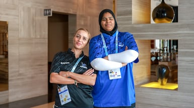 Emirati basketball player Khawla Ali with her coach Latifa Essarokh at the Special Olympics UAE Games where clubs and centres competed for selection to the national squad. Victor Besa / The National