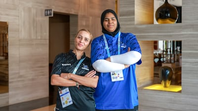 Ali, right, with her coach Latifa Essarokh. Victor Besa / The National
