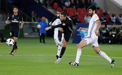 Cristiano Ronaldo scores Real Madrid's equaliser against Al Jazira during the Fifa Club World Cup semi-final at Zayed Sports City in Abu Dhabi. Matthew Childs / Reuters