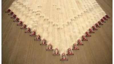 Workers harvest soybeans at a farm in Brazil. Sultan al Mansouri said the Emirates imported more than 85 per cent of its food and urged more investments be made in domestic agrictulture. Reuters