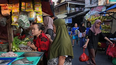 Shoppers at a market in Jakarta, Indonesia. Developing economies are expected to record slower growth this year at 3.6 per cent, down from 4.4 per cent in 2025. Bloomberg