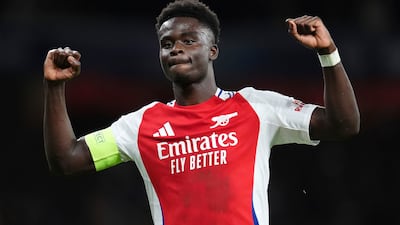Bukayo Saka celebrates scoring Arsenal's second goal in their 2-0 Champions League win over Paris Saint-Germain on October 1, 2024. AP