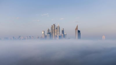 Early morning fog around the Dubai Marina area. Antonie Robertson / The National