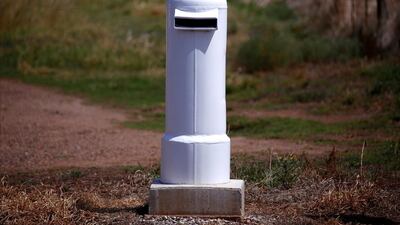 An old cylinder that used to cover an electricity box has converted into a mailbox in Gunnedah.