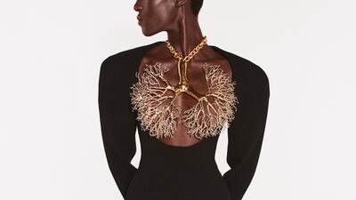 Schiaparelli delivered a dress adorned with the golden lungs