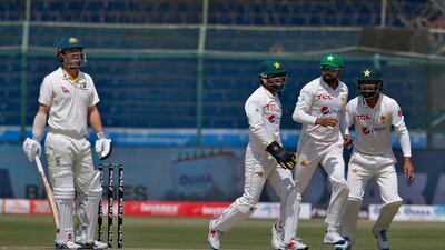 Pakistan celebrate the dismissal of Australia's Travis Head for 23. AP