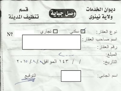 An ISIS tax receipt for cleaning services. Photo: Omar Mohammed