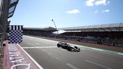 Mercedes' British driver Lewis Hamilton crosses the finish line to win. AFP