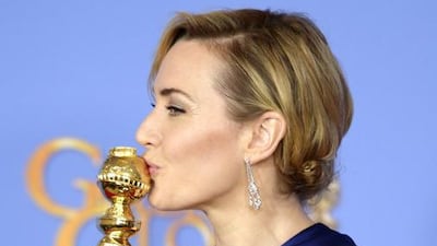 British actress Kate Winslet holds award for Best Supporting Actress in a Motion Picture for Steve Jobs in the press room during the 73rd annual Golden Globe Awards. Paul Buck / EPA