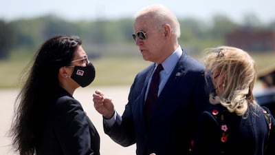 US President Joe Biden with US Representatives Rashida Tlaib and Debbie Dingell in Detroit, Michigan, US, May 18. Reuters