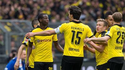 Dortmund’s Adrian Ramos (L) celebrates his 3-0 goal with teammates Mats Hummels (L-R), Felix Passlack, Pierre-Emerick Aubameyang and Marcel Schmelzer during the Bundesliga match between Borussia Dortmund and Hamburg at Signal Iduna Park in Dortmund, Germany, 17 April 2016. EPA/GUIDO KIRCHNER
