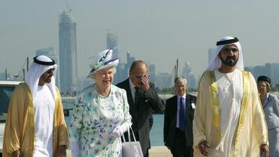 Britain’s Queen Elizabeth II and Prince Philip, accompanied by the prime minister of the UAE, Sheikh Mohammed Bin Rashid Al Maktoum, right, arrive to visit the Zayed National Museum in Abu Dhabi on November 25, 2010, as part of their visit to the Gulf. Arthur Edwards / AP photo