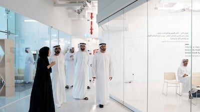 Sheikh Mohammed bin Rashid and Sheikh Mohamed bin Zayed inspect the newly-launched youth hub. Hamad Al Mansoori for the Ministry of Presidential Affairs ---