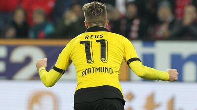 Borussia Dortmund's Marco Reus celebrates scoring the opener in his team's 2-0 Bundesliga win over Mainz on Friday night. Daniel Roland / AFP / October 16, 2015